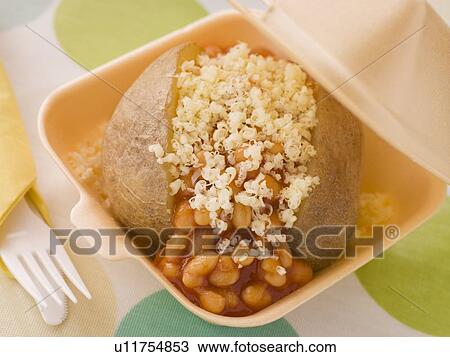 Stock Image - Baked Potato With Baked Beans And Cheese In A Take Away Box. Fotosearch