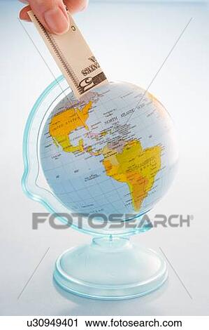 Stock Image - Bank Note And Globe. Fotosearch