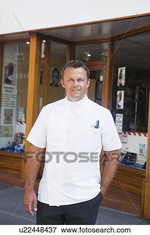 Barber standing outside shop. View Large Photo Image Stock Photo - Barber standing outside shop.. Fotosearch