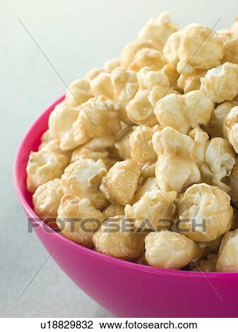 Stock Image - Bowl Of Toffee Popcorn. Fotosearch