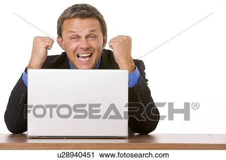 Businessman Cheering At Laptop View Large Photo Image Stock Image - Businessman Cheering At Laptop . Fotosearch