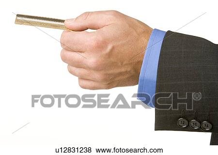 Businessman Holding A Gold Credit Card View Large Photo Image Stock Photo - Businessman Holding A Gold Credit Card . Fotosearch