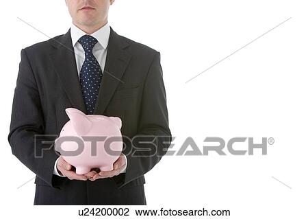 Stock Image - Businessman Holding Piggy Bank . Fotosearch
