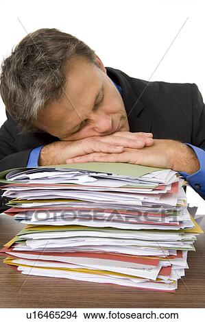 Businessman Overwhelmed By Paperwork View Large Photo Image Picture - Businessman Overwhelmed By Paperwork. Fotosearch
