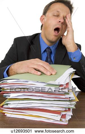 Businessman Overwhelmed By Paperwork View Large Photo Image Stock Image - Businessman Overwhelmed By Paperwork. Fotosearch