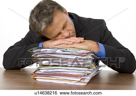Businessman Overwhelmed By Paperwork View Large Photo Image Stock Photograph - Businessman Overwhelmed By Paperwork. Fotosearch
