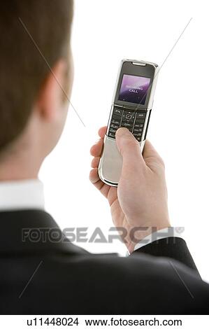 Picture - Businessman Text Messaging . Fotosearch