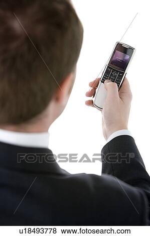 Stock Photo - Businessman Text Messaging . Fotosearch