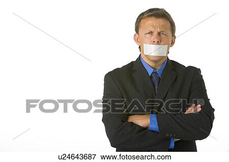 Stock Photo - Businessman With His Arms Folded And His Mouth Taped Shut . Fotosearch