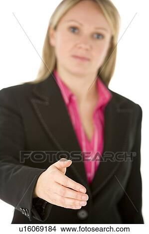 Picture - Businesswoman Holding Her Hand Out In Greeting. Fotosearch