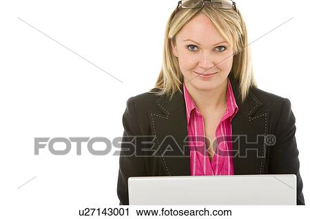 Stock Image - Businesswoman Sitting In Front Of Laptop . Fotosearch