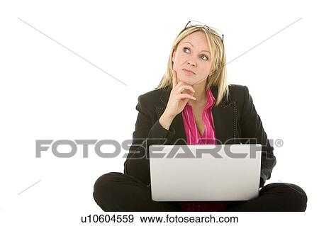 Businesswoman Sitting In Front Of Laptop Thinking View Large Photo Image Stock Photo - Businesswoman Sitting In Front Of Laptop Thinking. Fotosearch