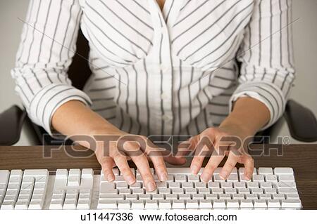 Businesswoman Typing View Large Photo Image Stock Photograph - Businesswoman Typing . Fotosearch