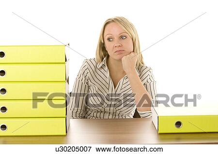 Stock Photo - Businesswoman With Stack Of Folders. Fotosearch