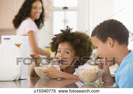 Children Eating Breakfast View Large Photo Image Stock Photography - Children Eating Breakfast. Fotosearch