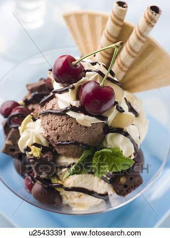 Chocolate Brownie Ice Cream Sundae View Large Photo Image Stock Image - Chocolate Brownie Ice Cream Sundae . Fotosearch