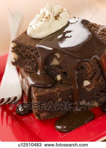 Chocolate Brownies On A Plate With Chocolate Fudge Sauce And Cream View Large Photo Image Stock Image - Chocolate Brownies On A Plate With Chocolate Fudge Sauce And Cream. Fotosearch