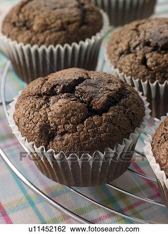 Chocolate Chip Muffins On A Cooling Rack View Large Photo Image Stock Image - Chocolate Chip Muffins On A Cooling Rack. Fotosearch