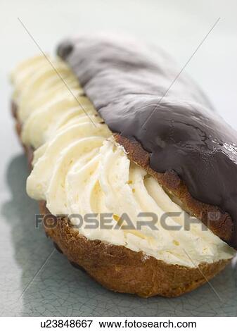 Chocolate Fondant Eclair View Large Photo Image Stock Photo - Chocolate Fondant Eclair. Fotosearch