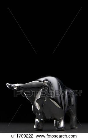 Stock Image - Close-Up Of Bull Figurine. Fotosearch