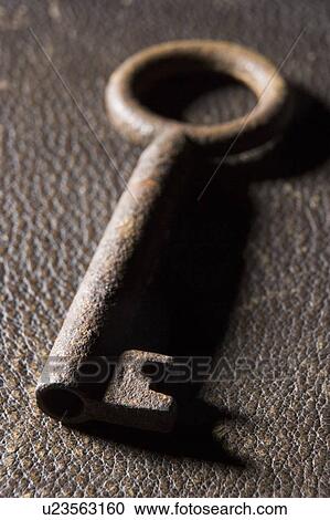 Stock Image - Close-Up Of Old-Fashioned Key. Fotosearch