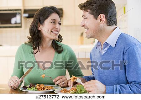 Couple Enjoying meal, mealtime Together View Large Photo Image Stock Image - Couple Enjoying meal, mealtime Together. Fotosearch
