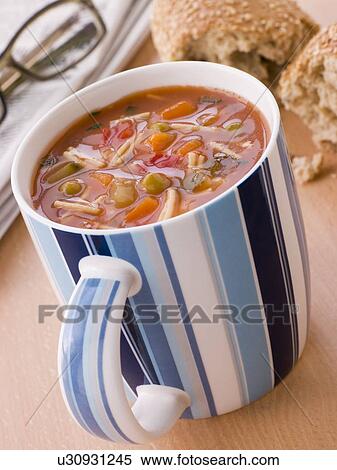 Cup Of Vegetable And Pasta Soup With A Granary Bread Roll View Large Photo Image Stock Photography - Cup Of Vegetable And Pasta Soup With A Granary Bread Roll. Fotosearch