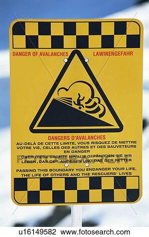 Stock Image - Danger of Avalanches sign on snowy mountain (selective focus). Fotosearch