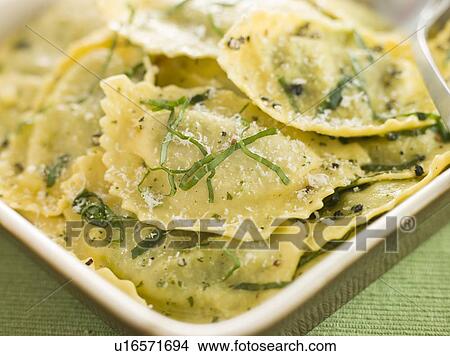 Dish of Spinach and Ricotta Ravioli and Sage Butter View Large Photo Image Picture - Dish of Spinach and Ricotta Ravioli and Sage Butter. Fotosearch