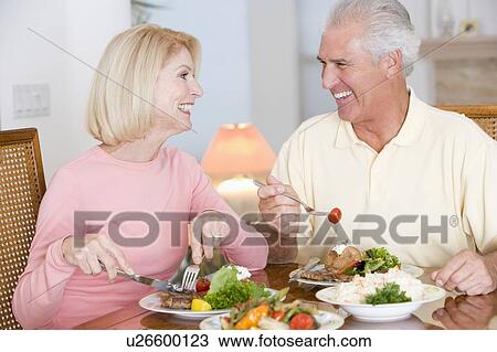 Elderly Couple Enjoying Healthy meal, mealtime Together View Large Photo Image Stock Image - Elderly Couple Enjoying Healthy meal, mealtime Together. Fotosearch