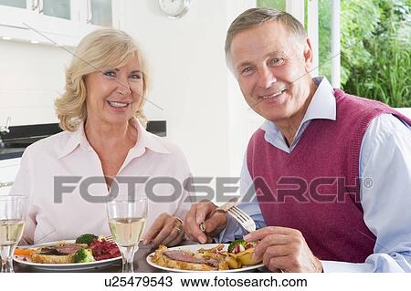 Elderly Couple Enjoying meal, mealtime Together View Large Photo Image Stock Image - Elderly Couple Enjoying meal, mealtime Together. Fotosearch