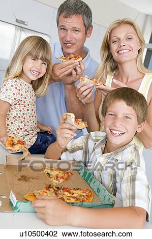 Family Eating Pizza Together View Large Photo Image Stock Image - Family Eating Pizza Together . Fotosearch
