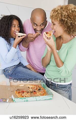Family Eating Pizza Together View Large Photo Image Stock Image - Family Eating Pizza Together . Fotosearch