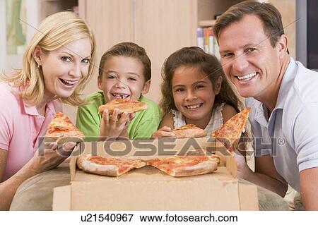 Family Eating Pizza Together View Large Photo Image Stock Photo - Family Eating Pizza Together . Fotosearch