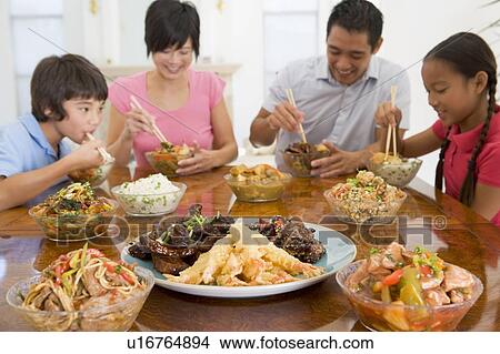 Family Enjoying meal, mealtime Together View Large Photo Image Picture - Family Enjoying meal, mealtime Together. Fotosearch