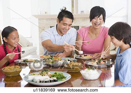 Stock Photo - Family Enjoying meal, mealtime Together. Fotosearch