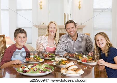 Family Enjoying meal, mealtime Together View Large Photo Image Stock Photo - Family Enjoying meal, mealtime Together. Fotosearch