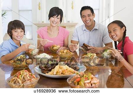 Stock Photograph - Family Enjoying meal, mealtime Together. Fotosearch