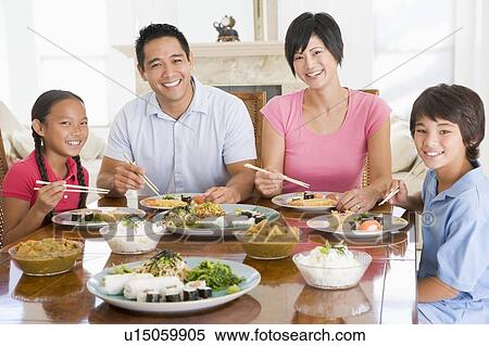 Stock Photography - Family Enjoying meal, mealtime Together. Fotosearch