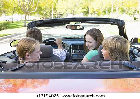 Family in convertible car smiling View Large Photo Image Stock Photography - Family in convertible car smiling. Fotosearch