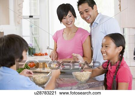 Family In Kitchen Eating Breakfast View Large Photo Image Stock Image - Family In Kitchen Eating Breakfast. Fotosearch
