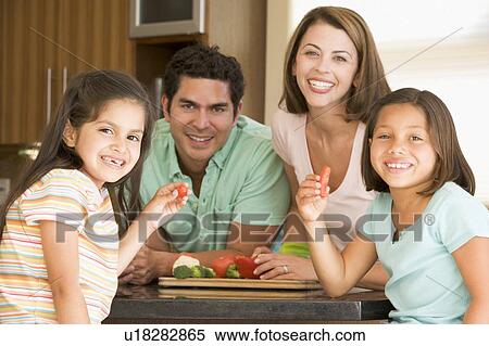 Family Preparing meal, mealtime Together View Large Photo Image Stock Photography - Family Preparing meal, mealtime Together . Fotosearch