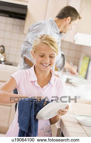Father And Daughter Cleaning Dishes View Large Photo Image Stock Image - Father And Daughter Cleaning Dishes. Fotosearch