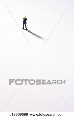 Figurine Of Businessman With Arms Crossed View Large Photo Image Stock Photo - Figurine Of Businessman With Arms Crossed. Fotosearch