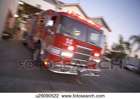 Fire engine leaving firehouse (blur) View Large Photo Image Stock Image - Fire engine leaving firehouse (blur). Fotosearch