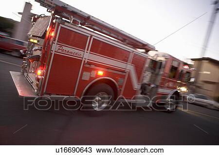 Fire engine on street (blur) View Large Photo Image Stock Image - Fire engine on street (blur). Fotosearch