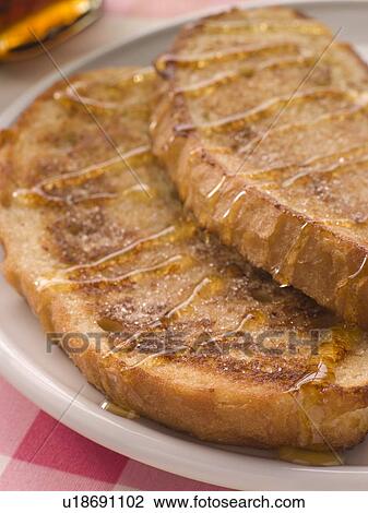 Stock Image - French Cinnamon Toast With Syrup. Fotosearch