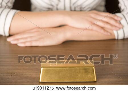 Gold Bar On Desk View Large Photo Image Stock Photography - Gold Bar On Desk . Fotosearch