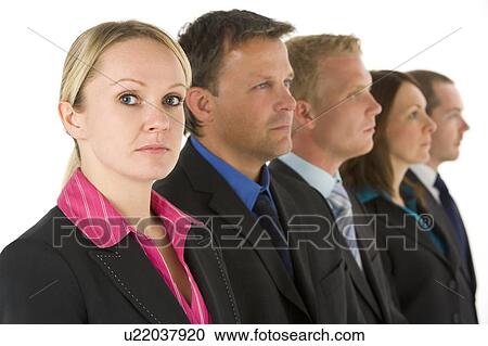 Group Of Business People In A Line Looking Serious View Large Photo Image Stock Image - Group Of Business People In A Line Looking Serious. Fotosearch