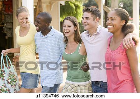 Group Of Teenagers Out Shopping View Large Photo Image Stock Photograph - Group Of Teenagers Out Shopping. Fotosearch